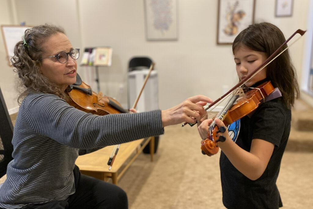 Violin Teacher and student
