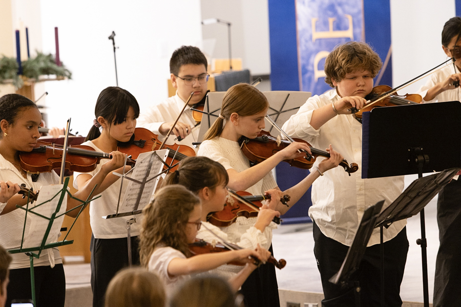 Boulder Suzuki Strings Violin Group Class Violin students performing in beginning orchestra class